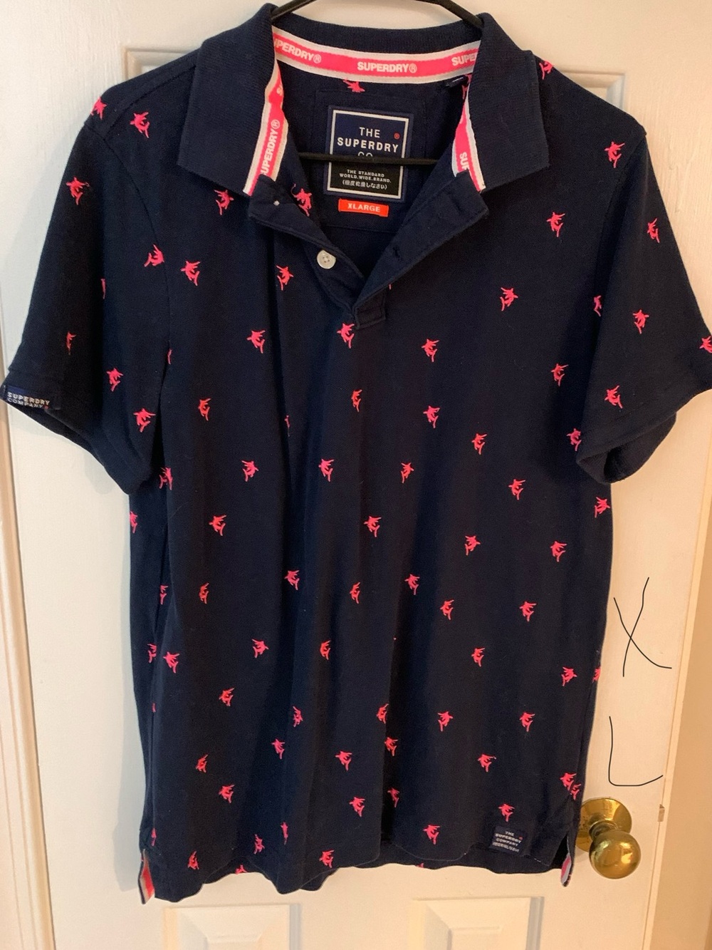 Superdry Navy Polo Shirt with Pink Embroidered Motifs